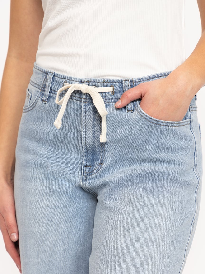 Women's High Rise Light Wash Wide Leg Jeans with a Tie Strap